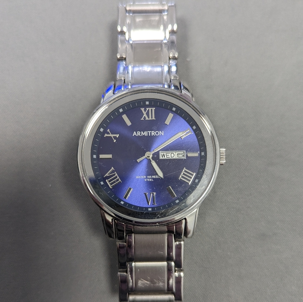Mens Gently worn Armitron PC33 watch. Works great. Looks great!